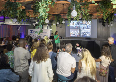 Guests enjoy a presentation by Prof Anil Madaree