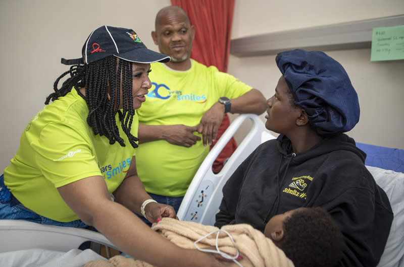 Dr Thembisile Matsinhe (CEO Themba Hospital), Dr Hlomane Tshehla (Provincial Oral Health Manager) and patient, Kwanele Dlhamini